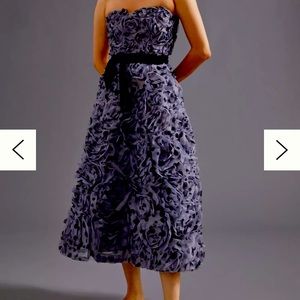 Beautiful Anthropologie strapless dress worn once , beautiful material!